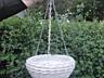 Кашпо для цветов из ротанга.