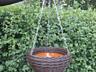 Кашпо для цветов из ротанга.
