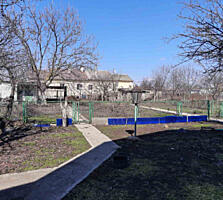 Участок в центре Беляевки