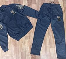 Продам новый костюм