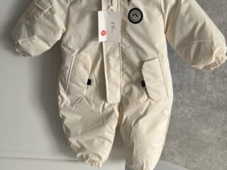 Продам новый комбинезон зимний