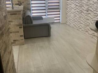 Продам новую 1-комнатную квартиру с ремонтом в современном комплексе .