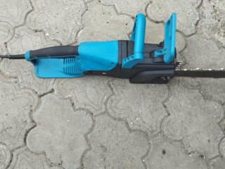 Продам электро пилу Макита