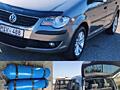 VW-TOURAN 2009г Газ-метан(28 куб) двиг 2.0 мех-ка 5ступ 7 МЕСТ