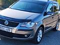 VW-TOURAN 2009г Газ-метан(28 куб) двиг 2.0 мех-ка 5ступ 7-МЕСТ