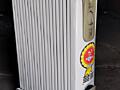 Продается электрический масляный радиатор б/у.