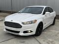 Ford fusion plugin hybrid 2015 год.