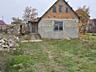 Продаётся небольшой каменный домик. Парканы.