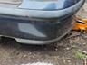 Продам задний бампер на Mazda 626 97