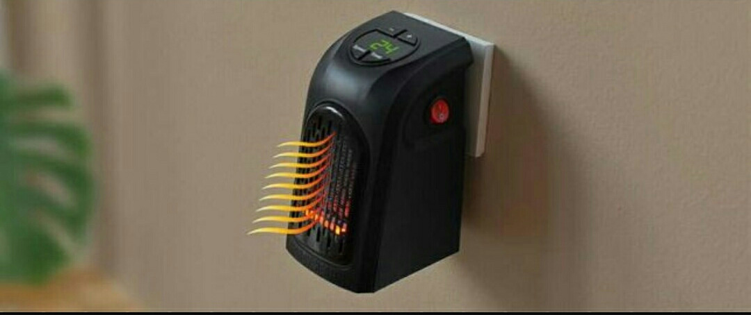 Телефон тепло. Обогреватель Handy Heater. Rovus Handy Heater. Обогреватель 400вт. Обогреватель Heater, 1999.