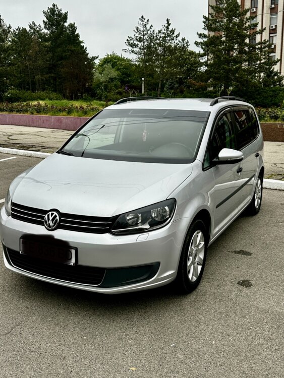 Volkswagen Touran 2011 год 7 мест газ-бензин