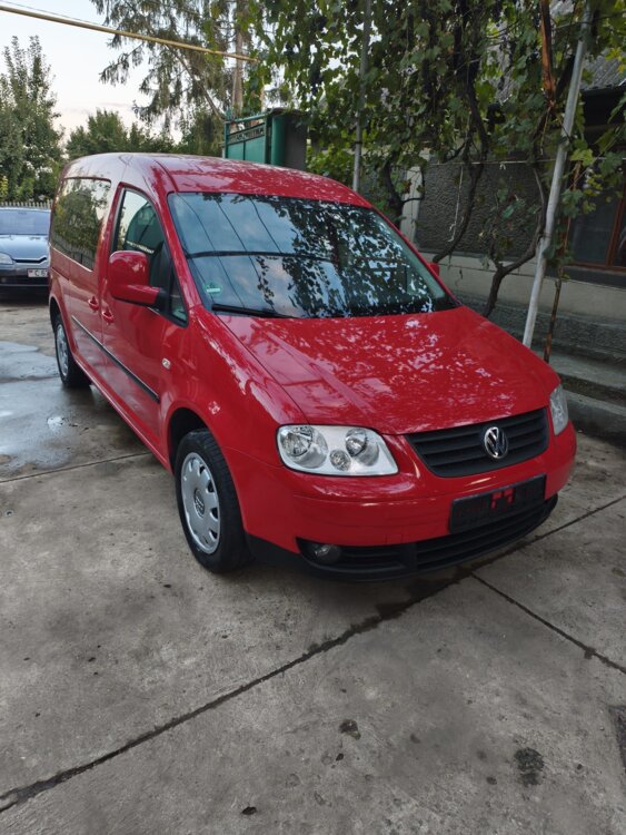 Volkswagen Caddy 2.0 заводской метан