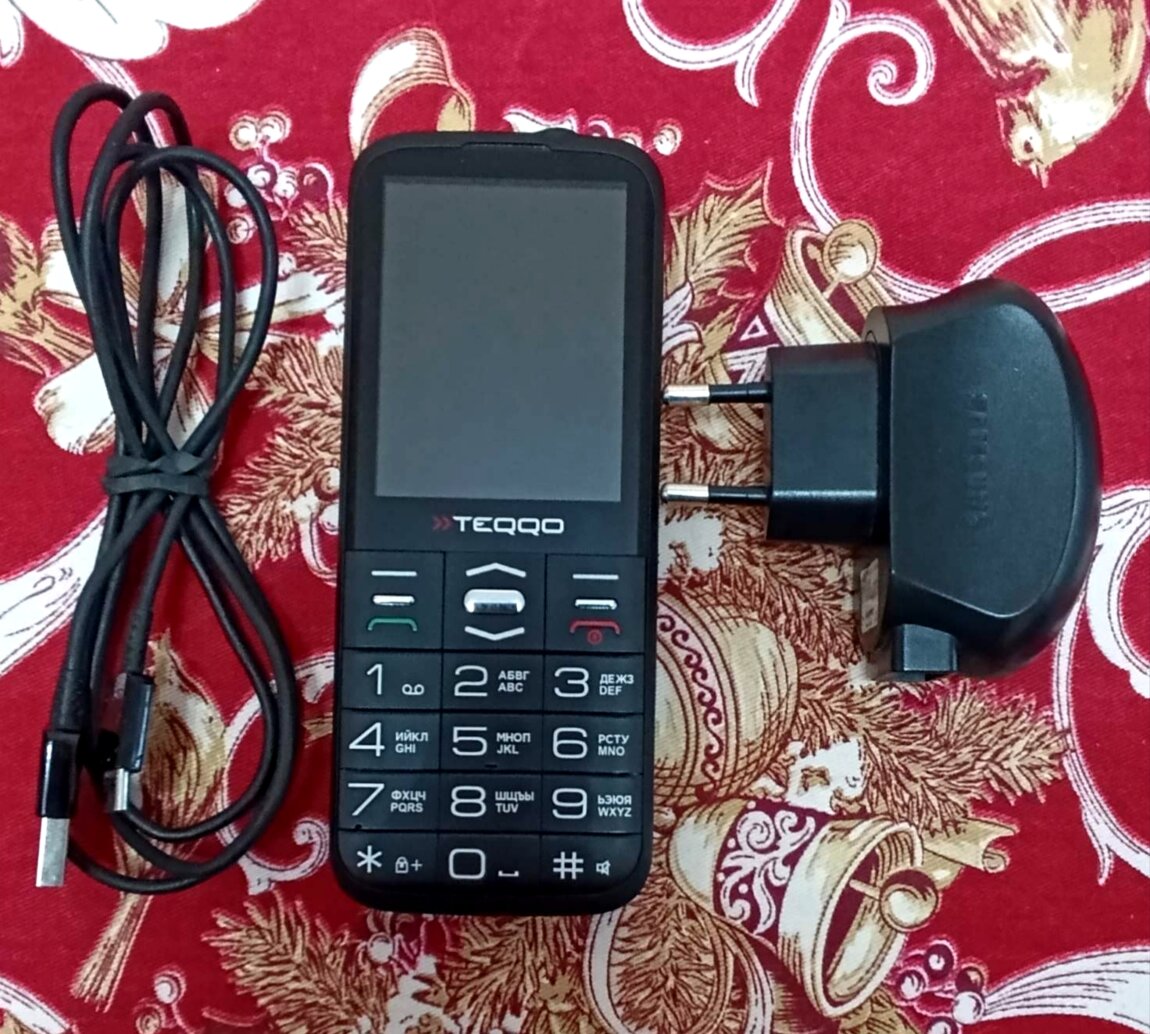 Телефон TEQQO.