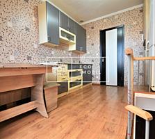 Apartament modern în două nivele situat într-un bloc secundar în ...