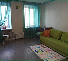 Продаётся одна комната в коммуне общей площадью 20 кв.м. в районе ЖД .
