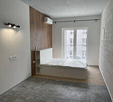 Продам квартиру-студию на Боровского в новострое в сданном кирпичном .