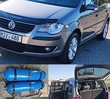 VW-TOURAN 2009г Газ-метан(28 куб) двиг 2.0 мех-ка 5ступ 7-МЕСТ