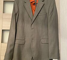Продается новый мужской костюм