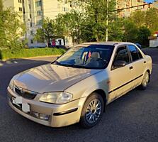Мазда 323
