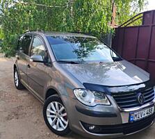 VW-TOURAN 2009г Газ-метан(28 куб) двиг 2.0 мех-ка 5ступ 7 МЕСТ