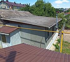 Casă de 72 m², cu teren privatizat.