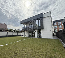 Vânzare casă modernă în stil Hi-Tech, amplasată în zonă rezidențială .