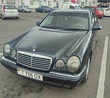 Мерседес 210