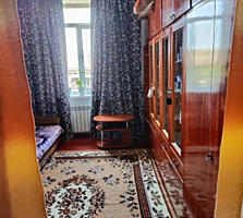 Продам две комнаты в комунальной квартире.