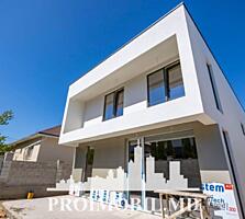 Vă propunem spre vânzare această casăcu 2 nivele în stil Hitech în ...