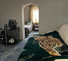 Продам квартиру на земле (домик) и гараж в р-не Большевик