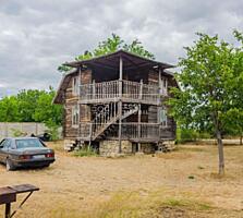 De vânzare casă de vacanță din lemn, amplasată la doar 50 metri de ...