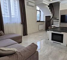 Предлагается к продаже стильный и современный трёхуровневый таунхаус .