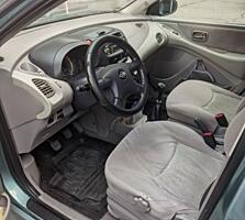 Ниссан Альмера Тина