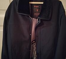 Продам теплую новую мужскую куртку