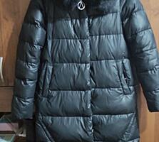 Продам пуховик в отличном состоянии размер 46-48.