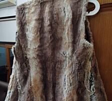 Продам жилетку меховую