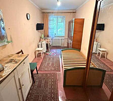 Продается комната в коммунальной квартире на первом этаже 5-этажного .