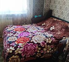 Продам самостоятельную комнату в коммуне в Лузановке. Кирпичный дом. .