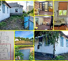 Продам полдома в Центре.