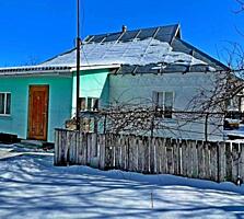 Дом с коммуникациями возле озера в Быковой Гребле.