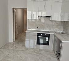 Продается просторная двухкомнатная квартира с ремонтом в новом доме в 