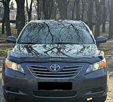 Toyota Camry, гибрид / метан.