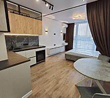 Просторная и очень уютная студия с шикарным дизайнерским ремонтом, ...