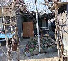 Продается часть дома в Дубоссарах, 2 комнаты, веранда, гараж. Удобства