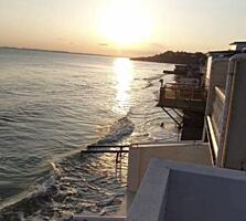 Продам 2-х поверховий курень на 1 лінії від моря  Новій Дофінівці  ...