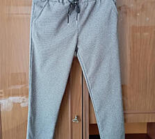 Pantaloni cu dungi de damă XL.