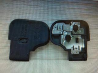 Крышка на фотоаппарат для аккумуляторного отсека