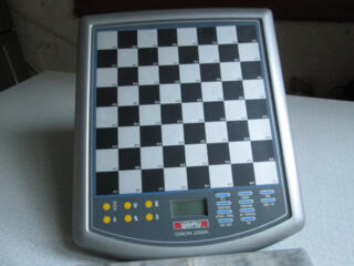 Шахматный компьютер "Орион 256к"-доска планшет "МИЛЛЕНИУМ 2000" 500р.