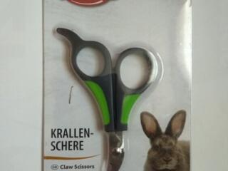 Продаются специальные ножницы для стрижки когтей питомцам : кроликам, кошка