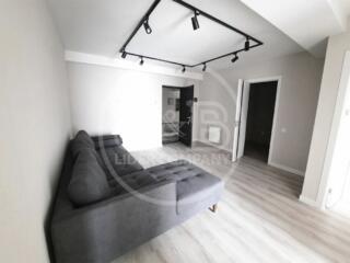 Vă propunem spre achiziție apartament cu 2 camere + living  Amplasat .